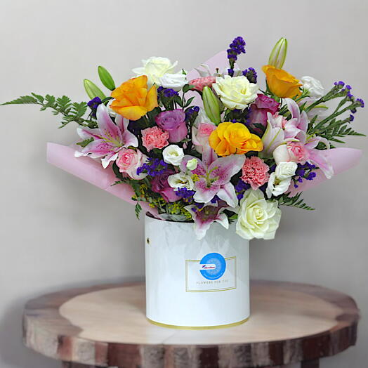 Blossom Symphony: Elegant Floral Box with Roses, Lilies, and Carnations