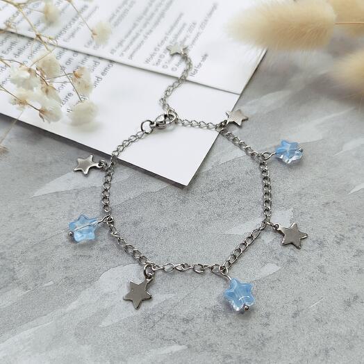 A bracelet with light blue stars