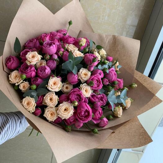Bouquet of bright peony roses and delicate roses Tanya