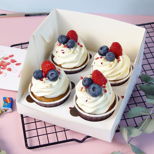 Juego de cupcakes de vainilla (4 piezas) con relleno de bayas como regalo