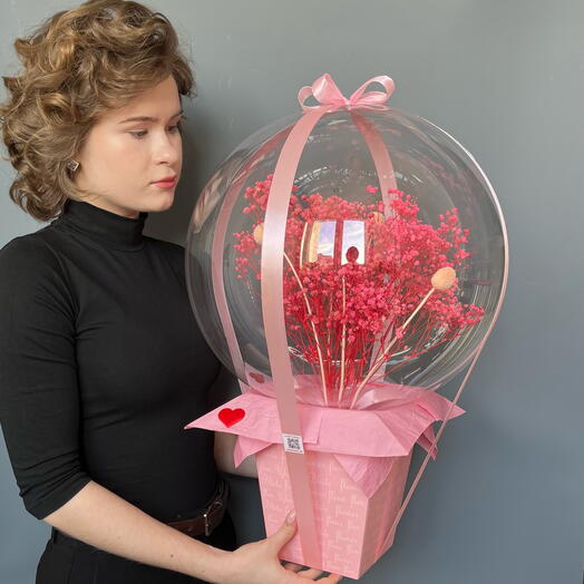 Romance is a large composition of a soft pink gypsophila with scabiosa in a ball