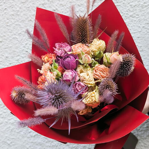 Bouquet of dried roses and spikelets