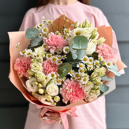 Bouquet of pink dianthus, chamomile and white eustoma