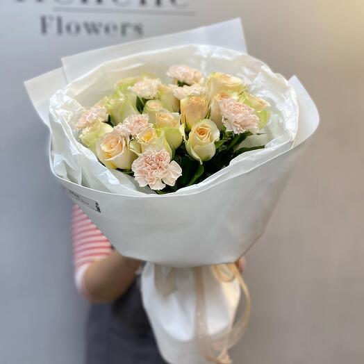 Delicate bouquet with roses and dianthus