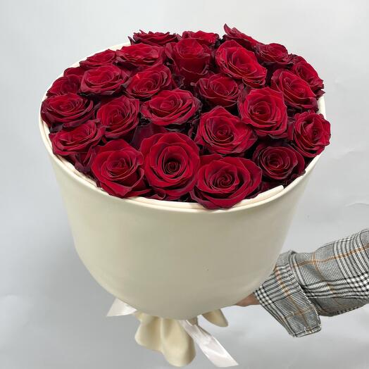 Red roses. 25 roses in a stylish package. Persistent