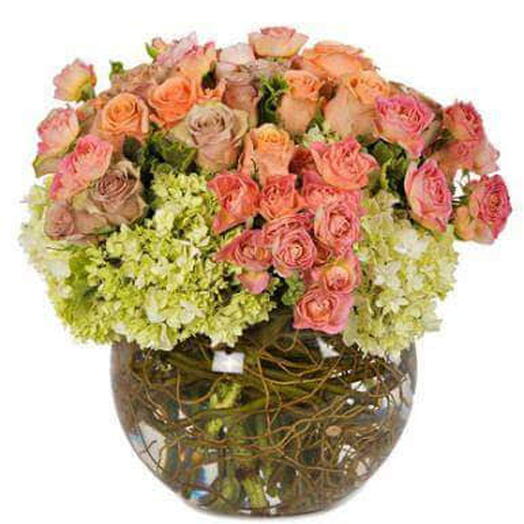 Elegante: 3 Green Hydrangeas, 5 Orange Baby Roses   3 Peach Baby Roses in a Fish Bowl