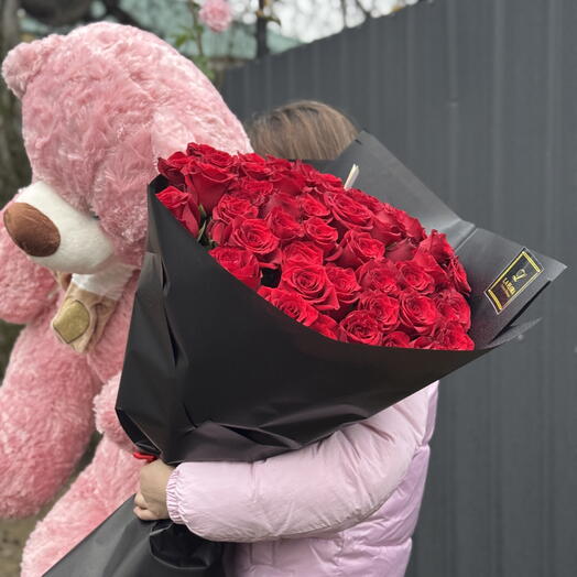 Teddy bear and bouquet