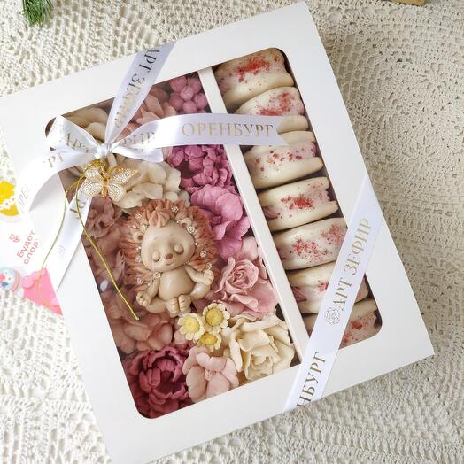 A set of marshmallow flowers, marshmallow sandwiches and a chocolate hedgehog figurine
