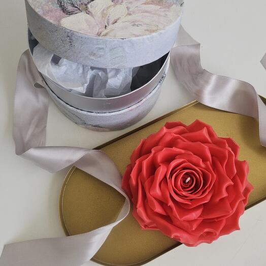 Candle-rose in gift box