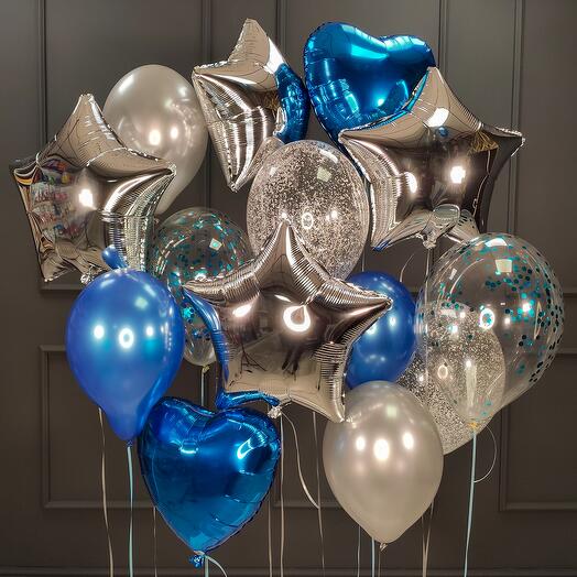 Composition of blue, silver and transparent balloons with confetti, hearts and stars