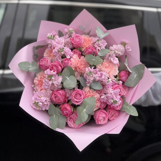 A vibrant bouquet with matthiola, Lady Bombastic peony roses, dianthus and eucalyptus