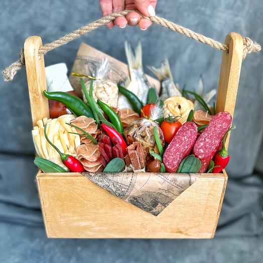 A box of sausage, fish, and cheese