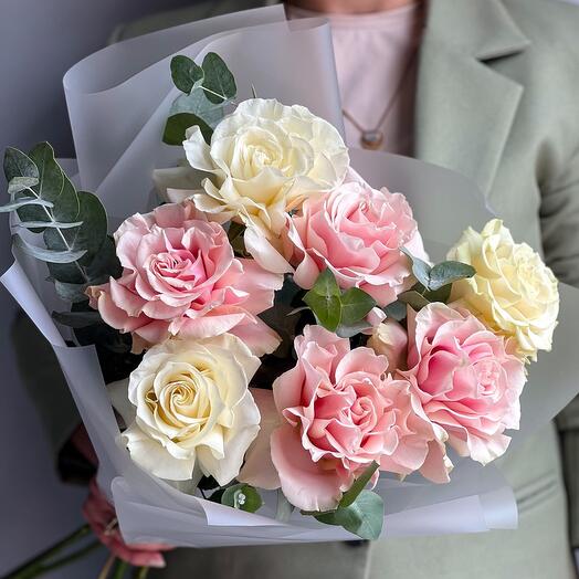 French roses with eucalyptus are a delicate bouquet in pink