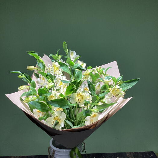 Bouquet of white alstroemeria in craft
