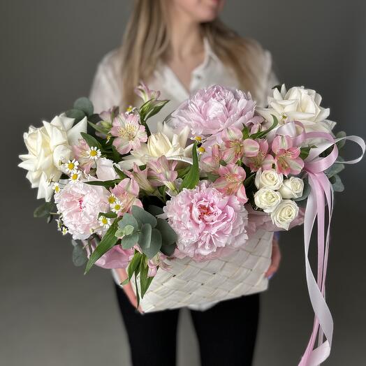 Basket with peonies and French roses