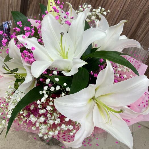 Bouquet of lilies with gypsophila