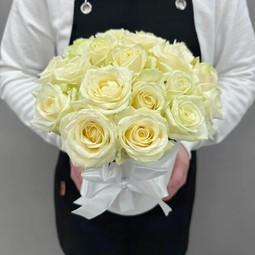 Boxes with flowers. White Roses.