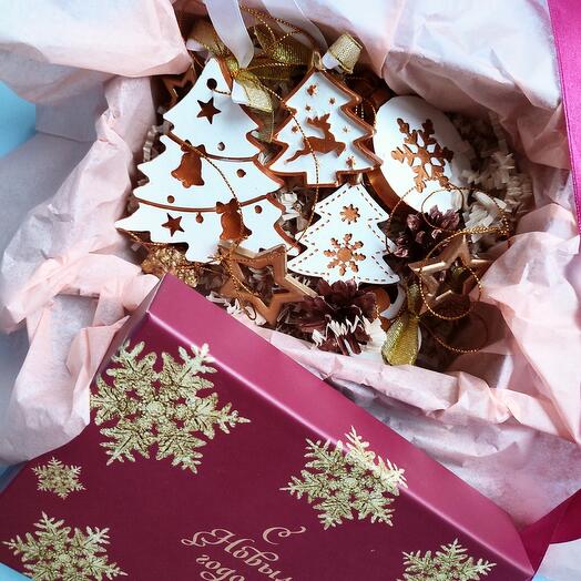 A set of Christmas tree decorations is a gift. White with stars