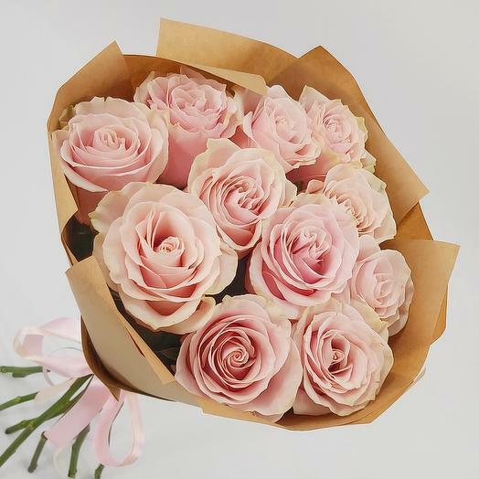 11 soft pink roses in kraft paper