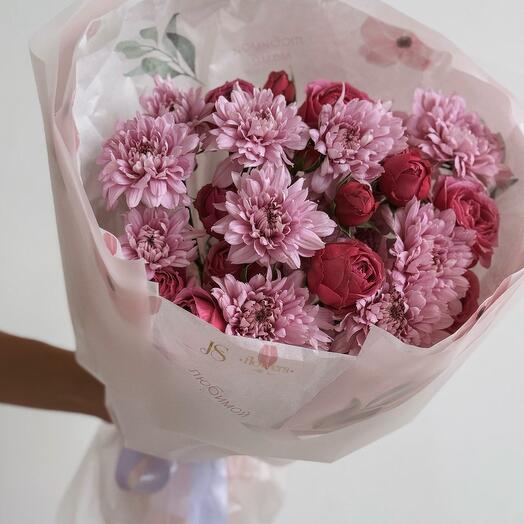 Stylish delicate bouquet of bushy pink chrysanthemums and peony-shaped roses
