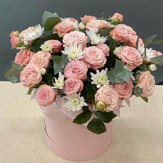 Bush Roses with chrysanthemums in a box