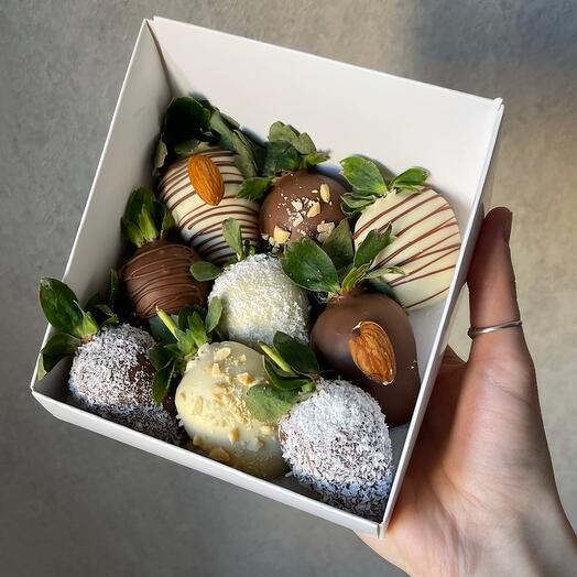 Set of chocolate-covered strawberries with nuts