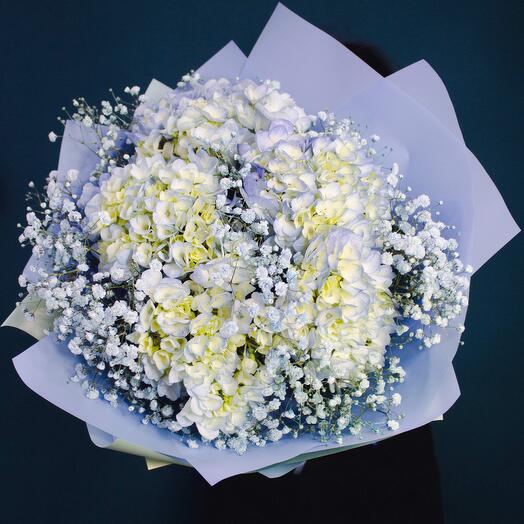 Above the sky, a bouquet of hydrangeas