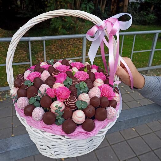 Basket with strawberries and flowers