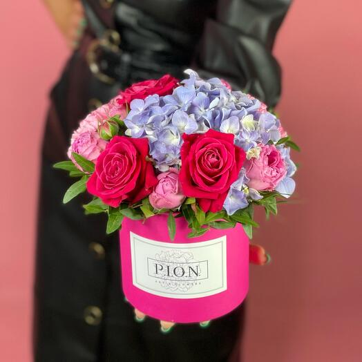 Hydrangeas and roses in a box