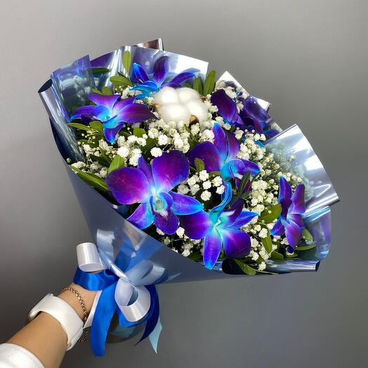 Bouquet with cosmic flowers in cotton