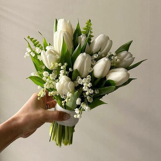 Bouquet of white tulips and lilies of the valley