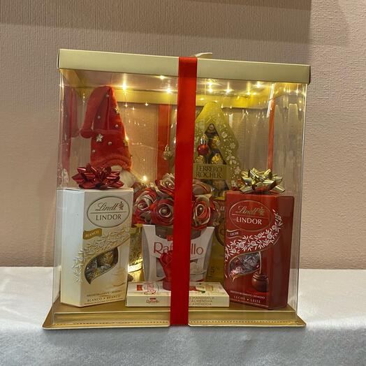 Caja de regalo iluminada roja y dorada