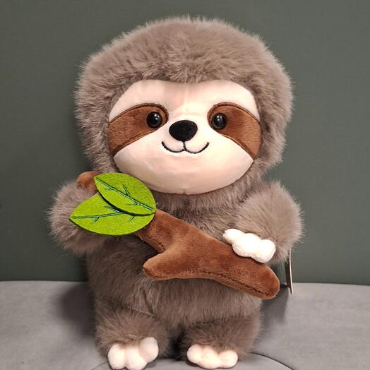 Игрушка ленивец с веткой