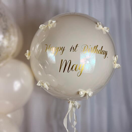 Шар гигант Баблс с надписью кремовый с бантами 55см. Helium giant bubble balloon with inscription cream color with bows 55cm