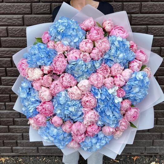 Peonies with blue hydrangeas