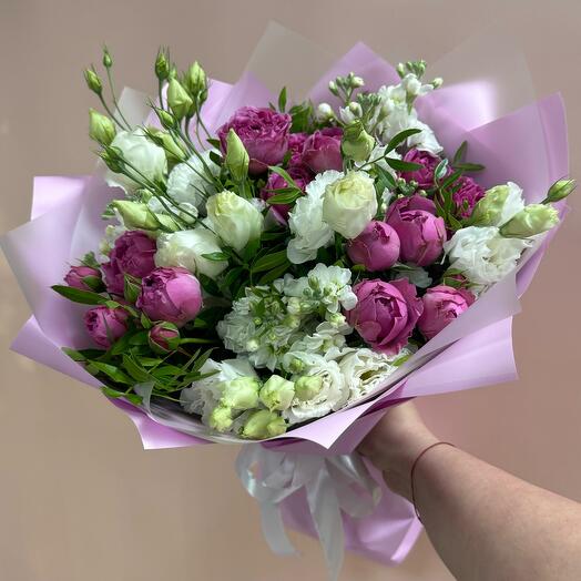 Delicate bouquet with eustoma mattiola and bush rose