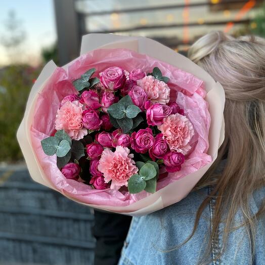 A gentle compliment with a bush rose and a carnation