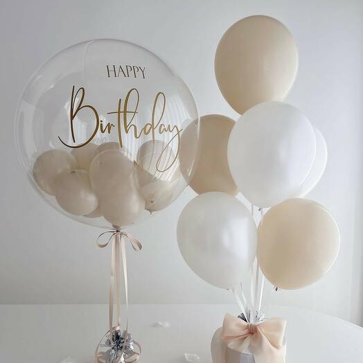 Helium balloons for a girl's birthday, a girl beige balloons white balloons