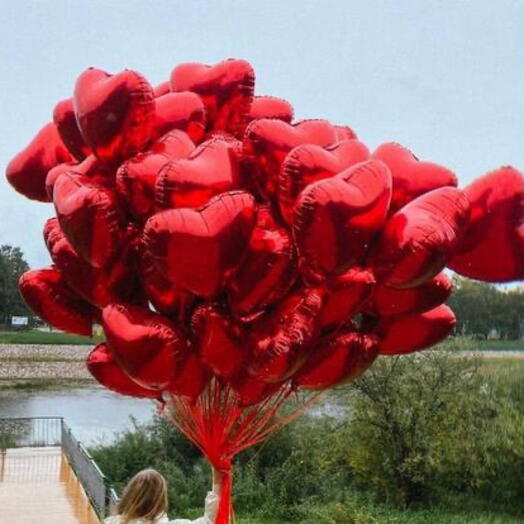 Armful of 65 balls of foil hearts