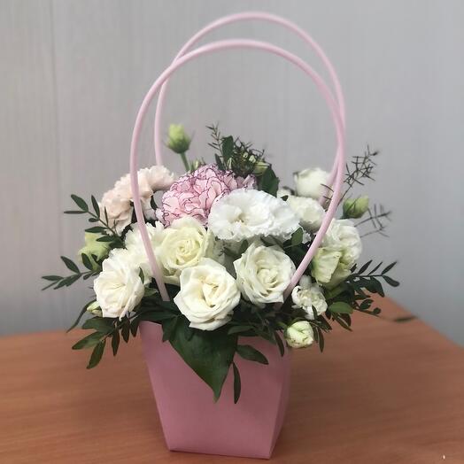 Composition of white bush rose and dianthus