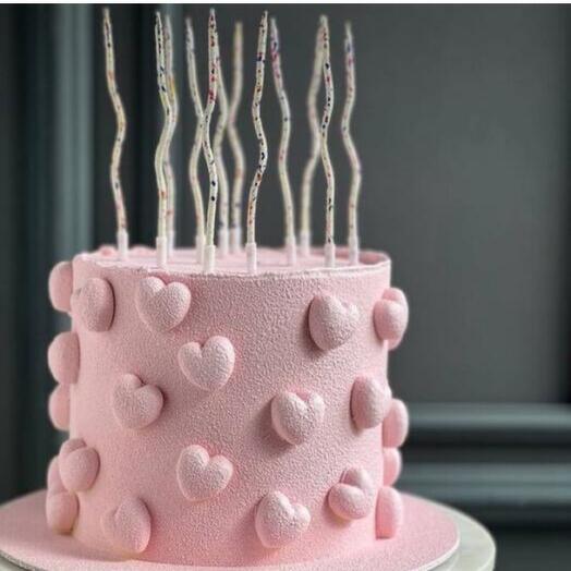 Pink cake with hearts