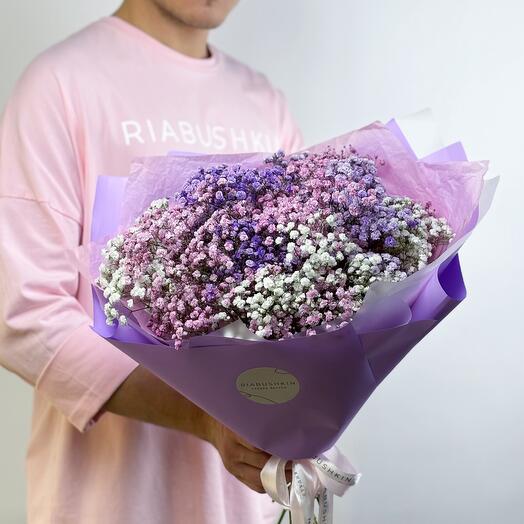 Delicate bouquet of white, lilac and pink gypsophila