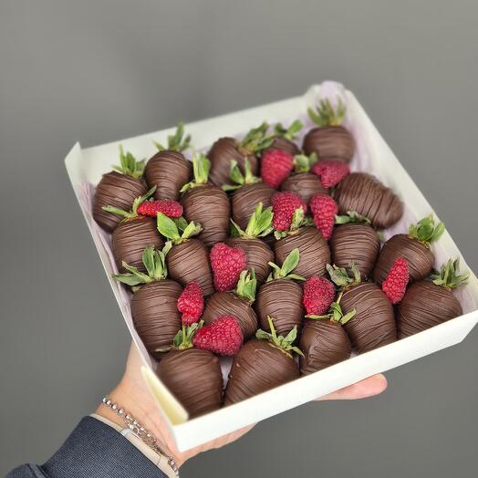 Chocolate-covered strawberries with raspberries, very tasty