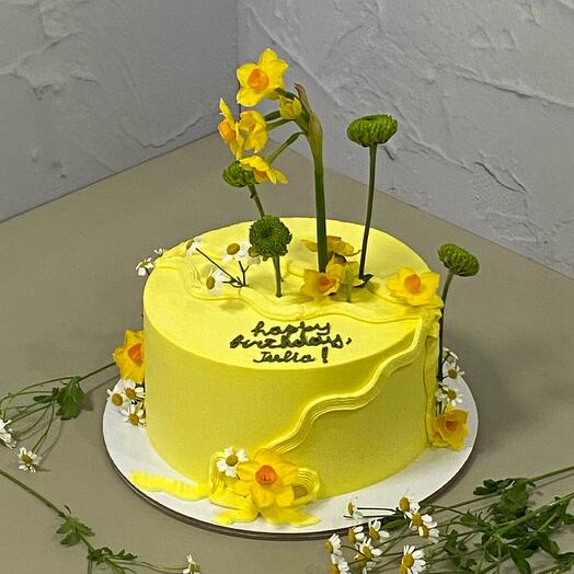 A "Spring Mood" birthday cake adorned with fresh flowers for mom, sister, friend, or beloved.