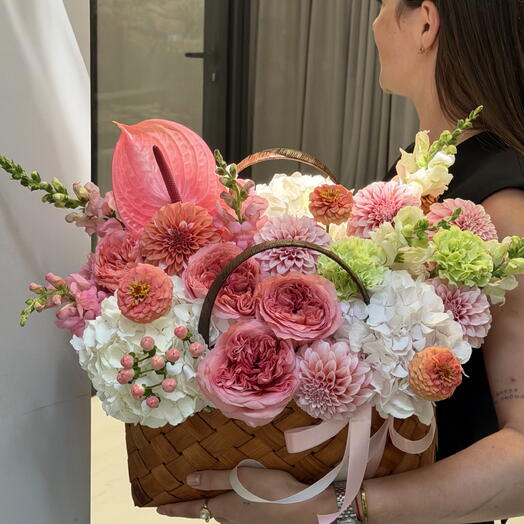 Summer mix with peony roses in a basket
