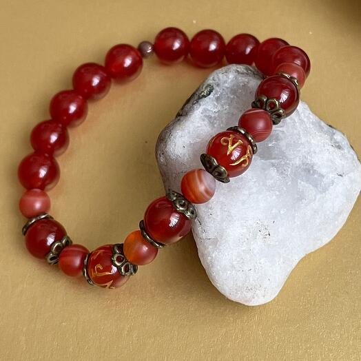 Carnelian bracelet with mantras for good luck and prosperity