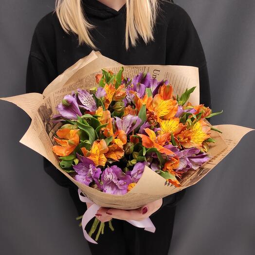Bouquet of purple and orange alstroemeria in craft