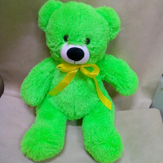 The bear is light green