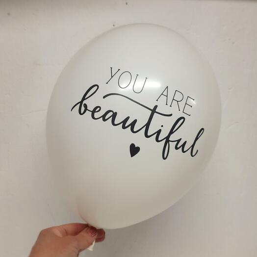 The balloon is white. You're beautiful