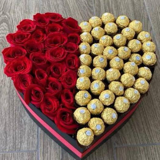 Rose and chocolate in box